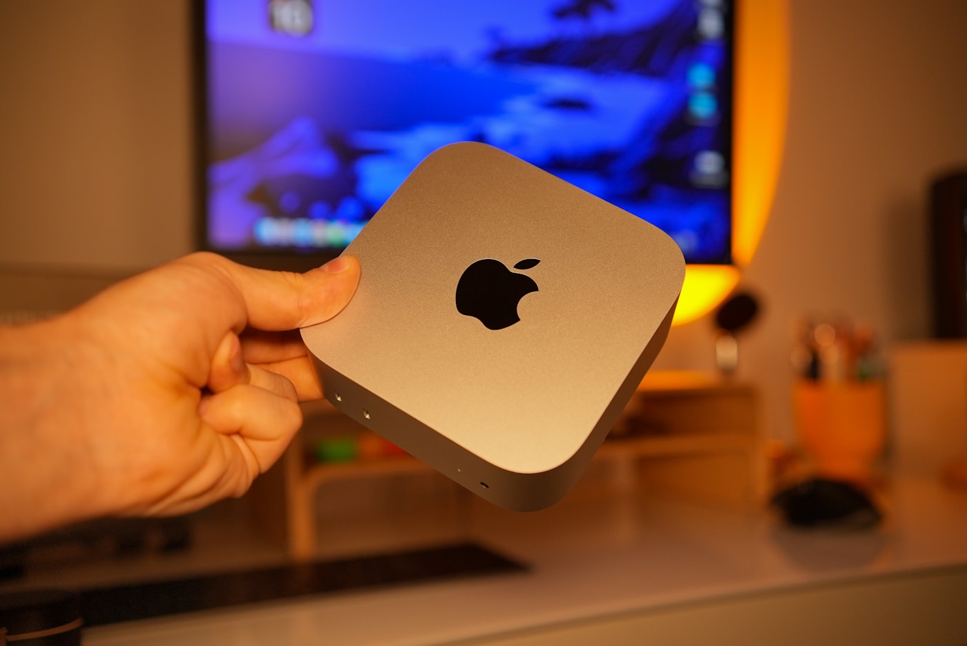 The ReadyClaw Mac mini in hand — small enough to carry with you