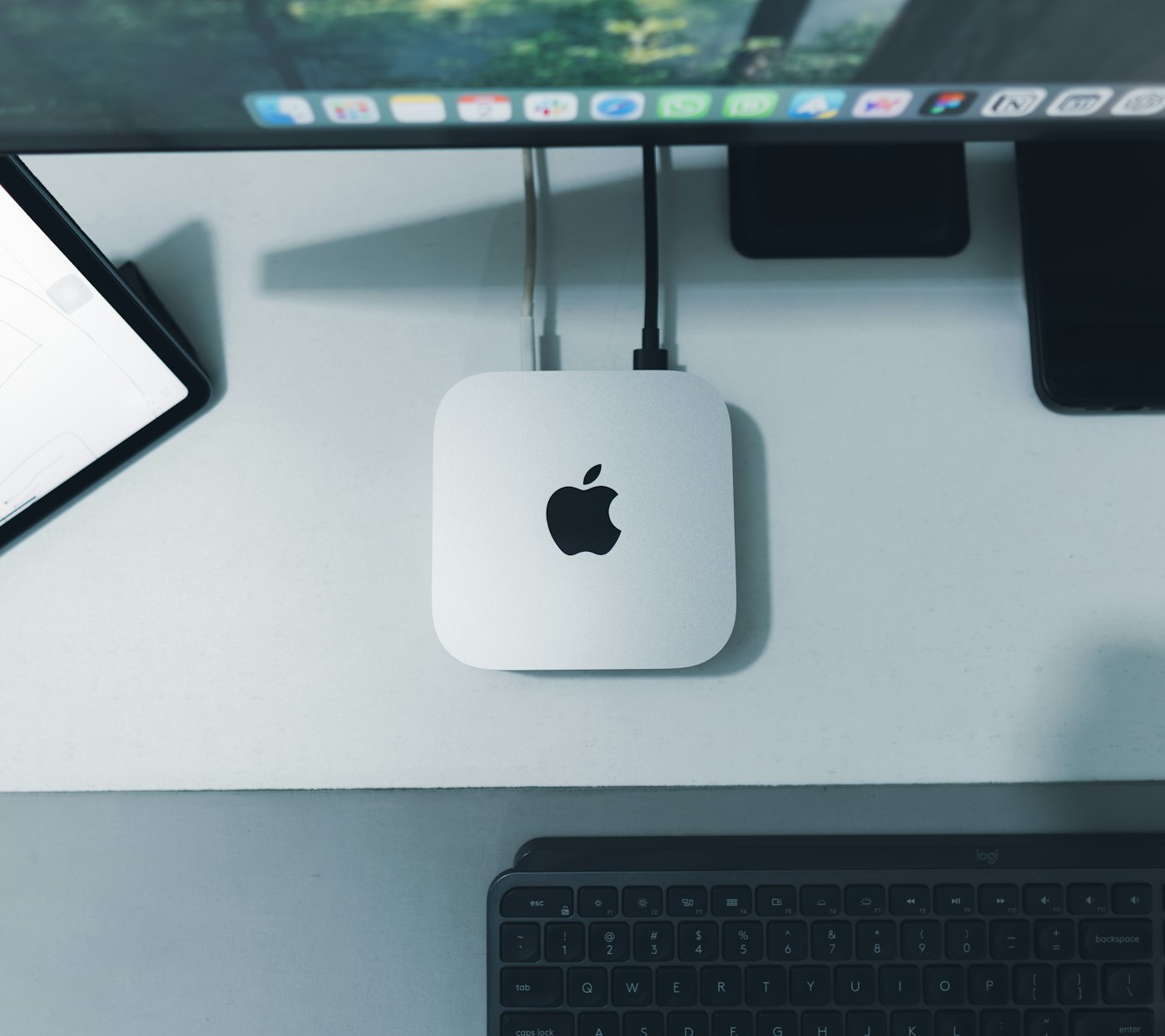 Mac mini on a tidy desk, top-down view